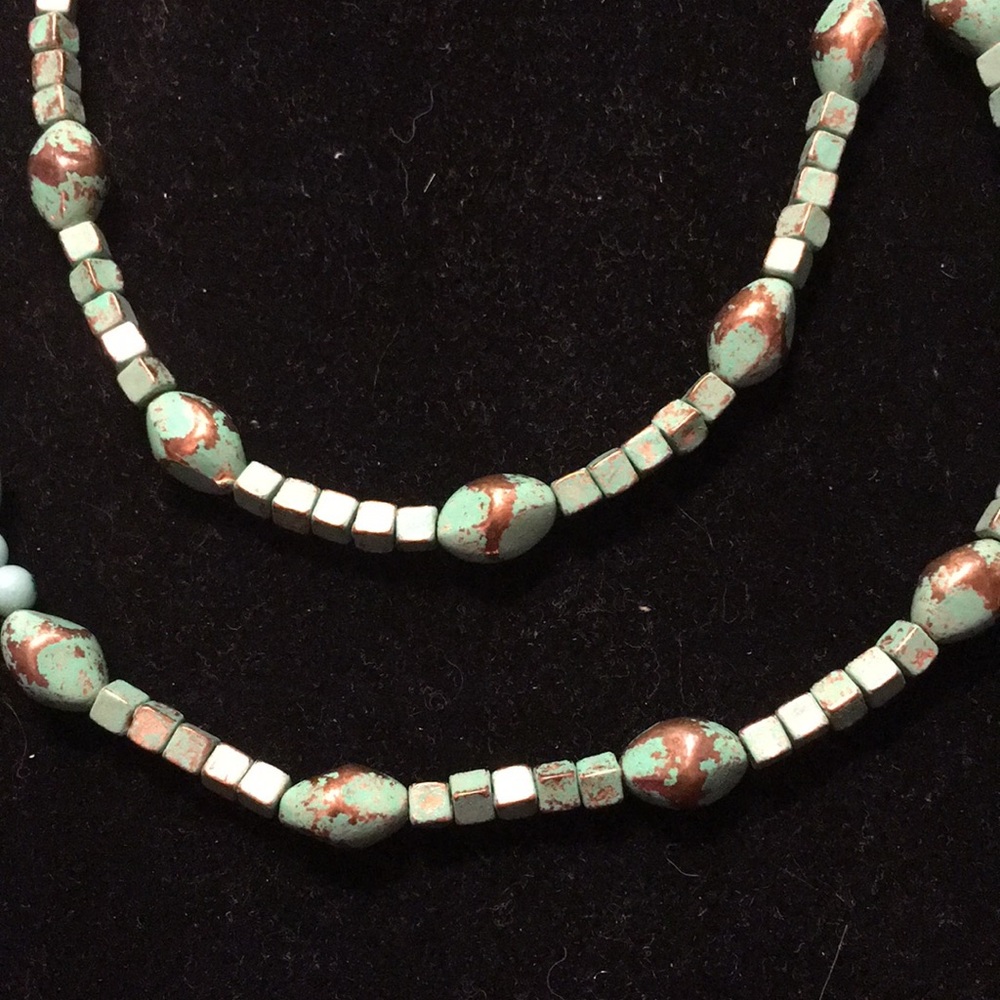 42” approximately faux turquoise w/ copper accents